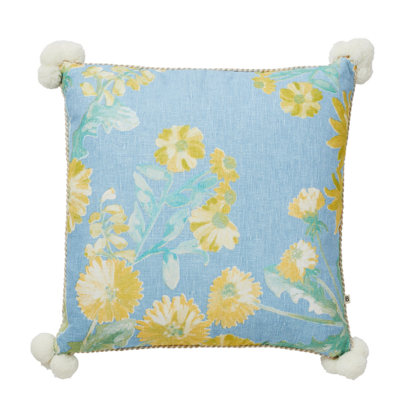 Image of Garden Patch Blue Cushion with natural raffia and pom pom trim.
