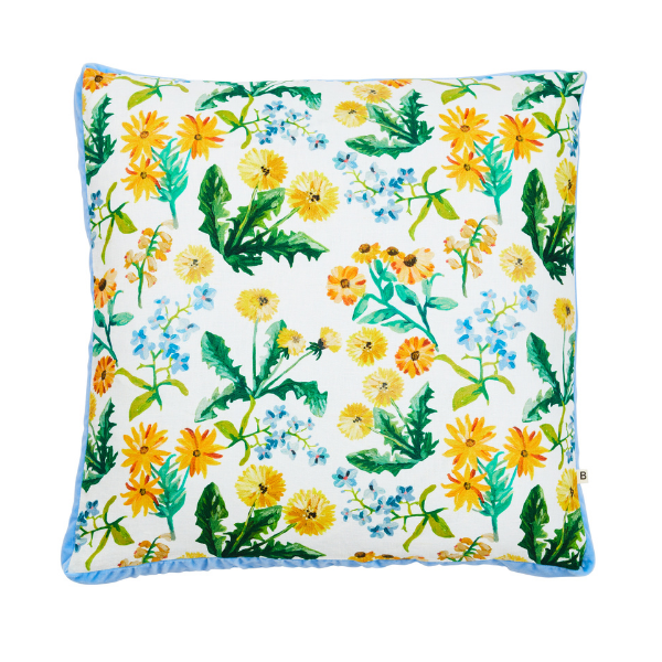 Image of 50 x 50 box cushion with yellow dandelion design on white linen and pale blue velvet trim.