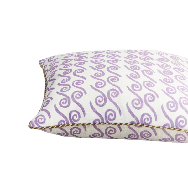 Image of 50 x 50 box cushion with lilac swirls on oat linen finished with a rust raffia trim.