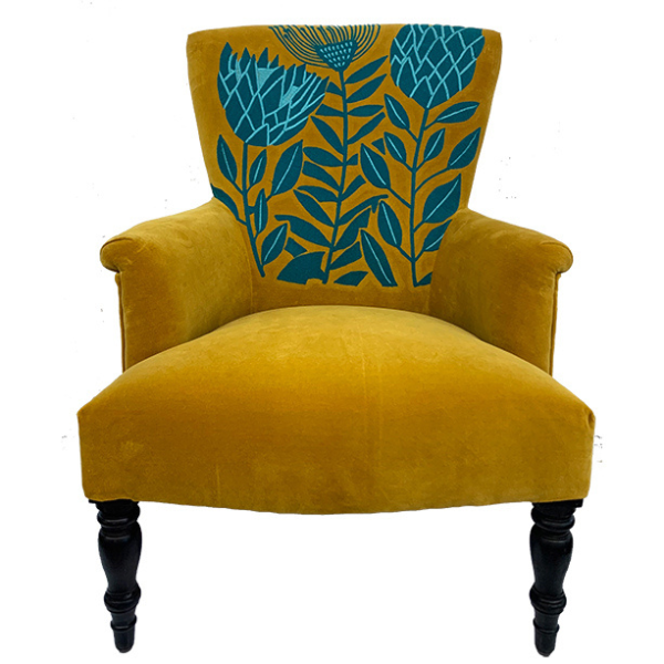 Image of velvet mustard arm chair with turquoise waratah embroidery.