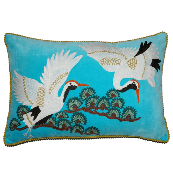 Image of blue velvet lumbar cushion with Japanese crane bird embroidery.