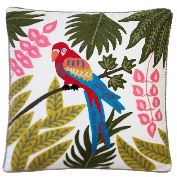 Image of white cotton cushion with red &amp; blue parrot and native foliage embroidery.