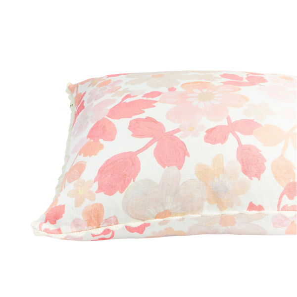 Image of 60 x 60 cm cushion with pink and cream flowers on white linen.
