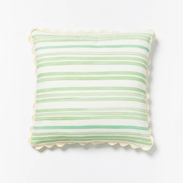 Image of 60 x 60 cm cushion with green, grey and white tone stripes on white linen with scalloped trim.
