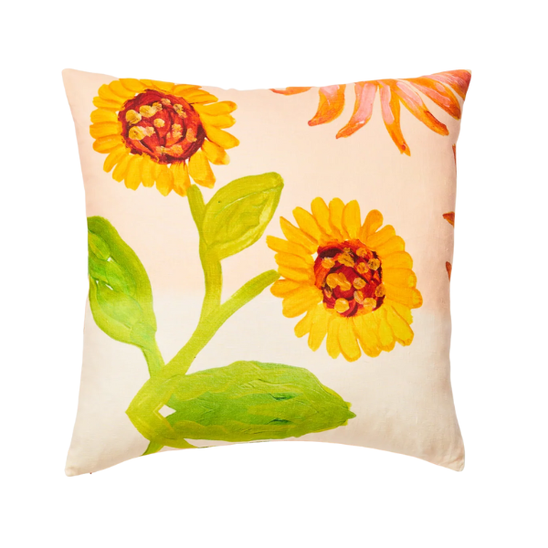 Image of 60 x 60 cm cushion with bright floral patterns on pink linen.