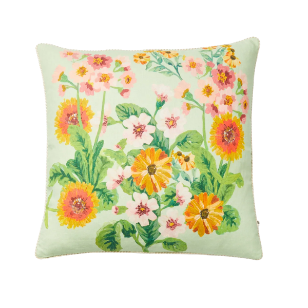 Image of 60 x 60 cm cushion with bright floral patterns on mint linen.