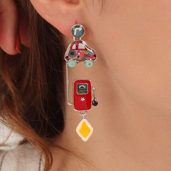 Image of model wearing earrings with car and red petrol pump as dangles all hand painted on silver stud finish.