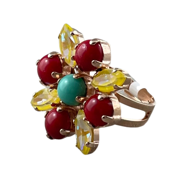 Image of ornate dress ring set with yellow, red and aqua crystals and stones over an 18ct rose gold adjustable band.