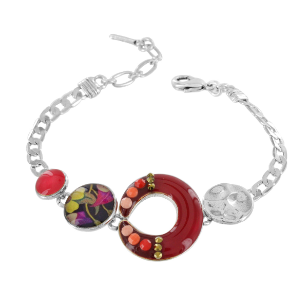 Image of bracelet encrusted with hand painted patterns and stones.