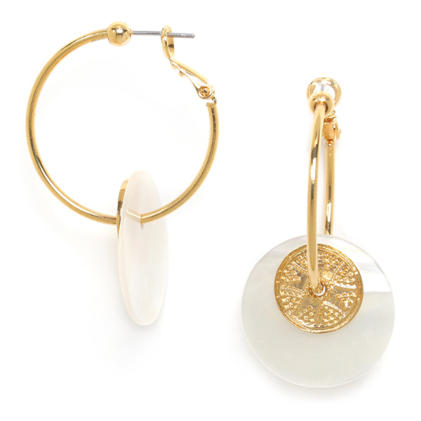 Image of creole earrings with mother of pearl disc and gold metal tassels dangle.