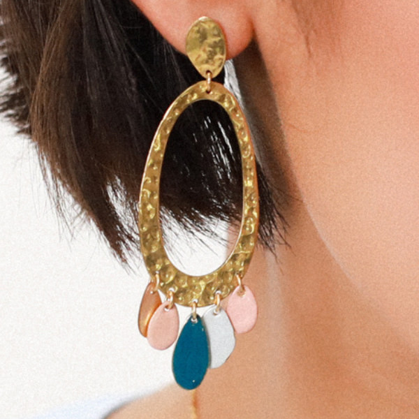 Image of gold metal post earrings with large gold coloured ring dangle.