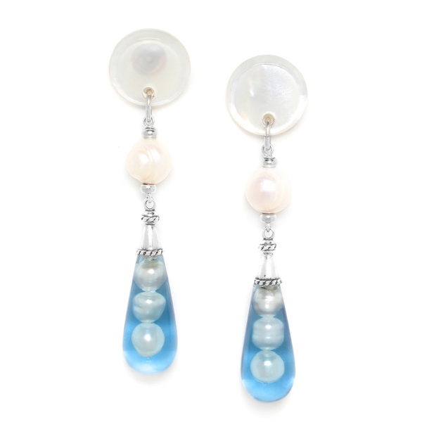 Image of white mop round post earrings with pearl drops inside clear blue resin.