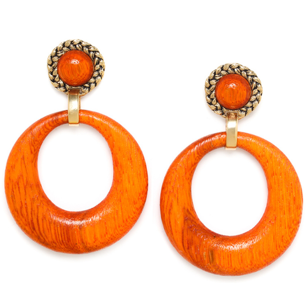 Image of round earrings with papaya inspired centre edged with a rusty gold metal and large bronze roble dangle.