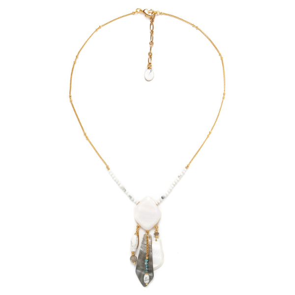Image of gold chain necklace encrusted with tiny white beads and large dangle pendant.