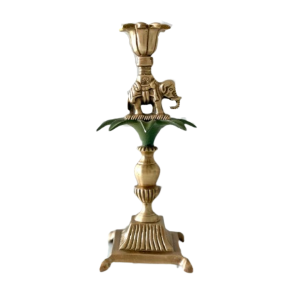 Image of British Colonial style candle holder, honed from brass, featuring an elephant and palm leaf theme.