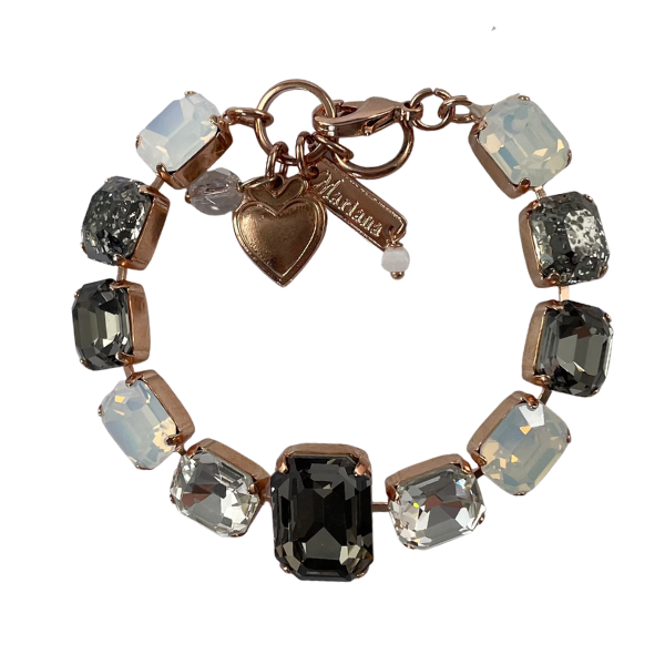 Image of bracelet with chunky, rectangular, Swarovski Crystals. Charcoal, clear and milky white crystals create a elegant style.