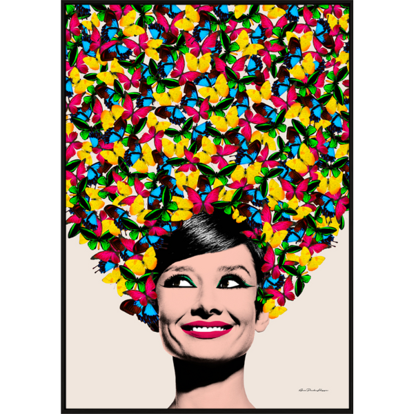 A smiling Audrey Hepburn with a gorgeous cascade of colourful butterflies as a headdress