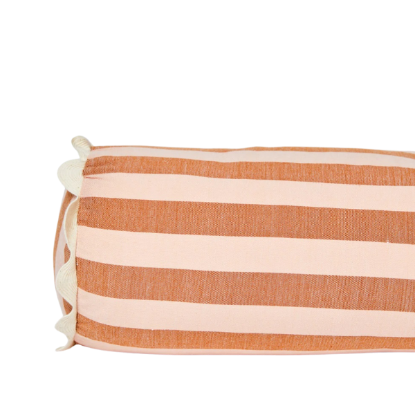 Image of Woven Stripe Buff Bolster Cushion with a cream scalloped trim.