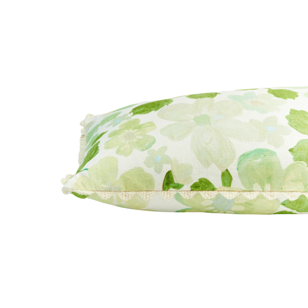 Image of cream 60 x 40 cm cushion with green floral pattern.