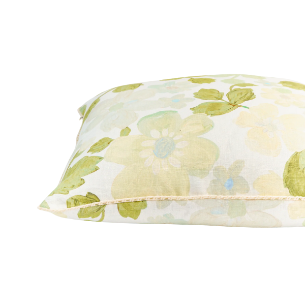 Image of cream 50 x 50 cm cushion with green floral pattern.