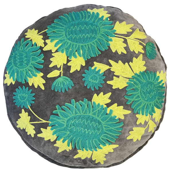 Image of charcoal velvet ottoman cushion embroidered with vibrant teal chrysanthemum and mint green foliage.