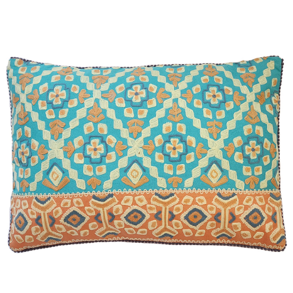 Image of cotton lumbar cushion with tribal diamonds pattern in aqua, white and orange embroidery.