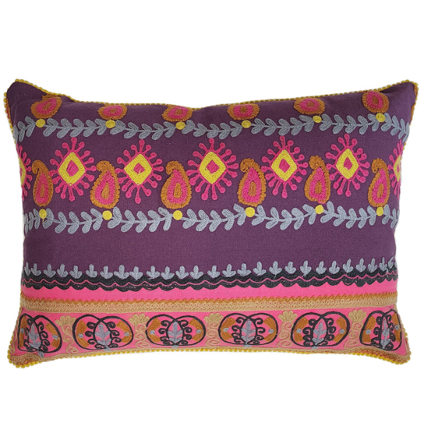 Image of purple cotton lumbar cushion with tribal paisley pattern in purple, pink and yellow embroidery.
