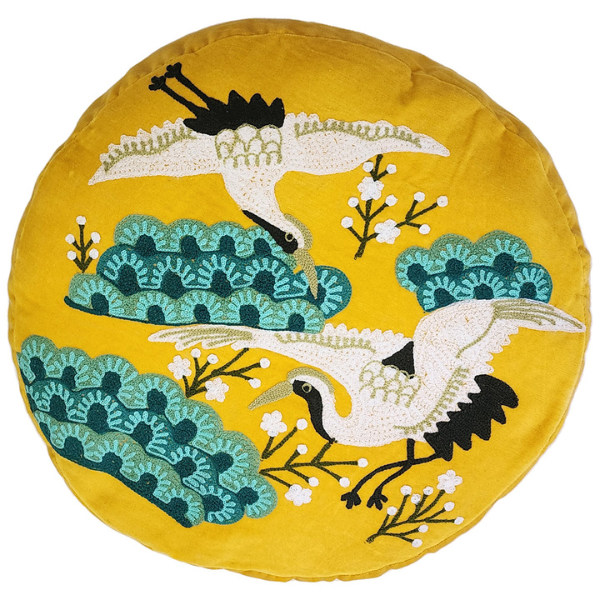 Image of yellow velvet ottoman cushion with Japanese crane bird embroidery.