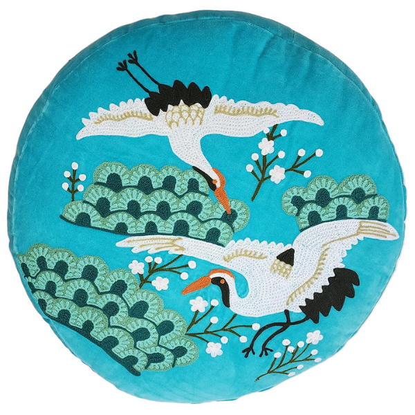 Image of aqua velvet ottoman cushion with Japanese crane bird embroidery.