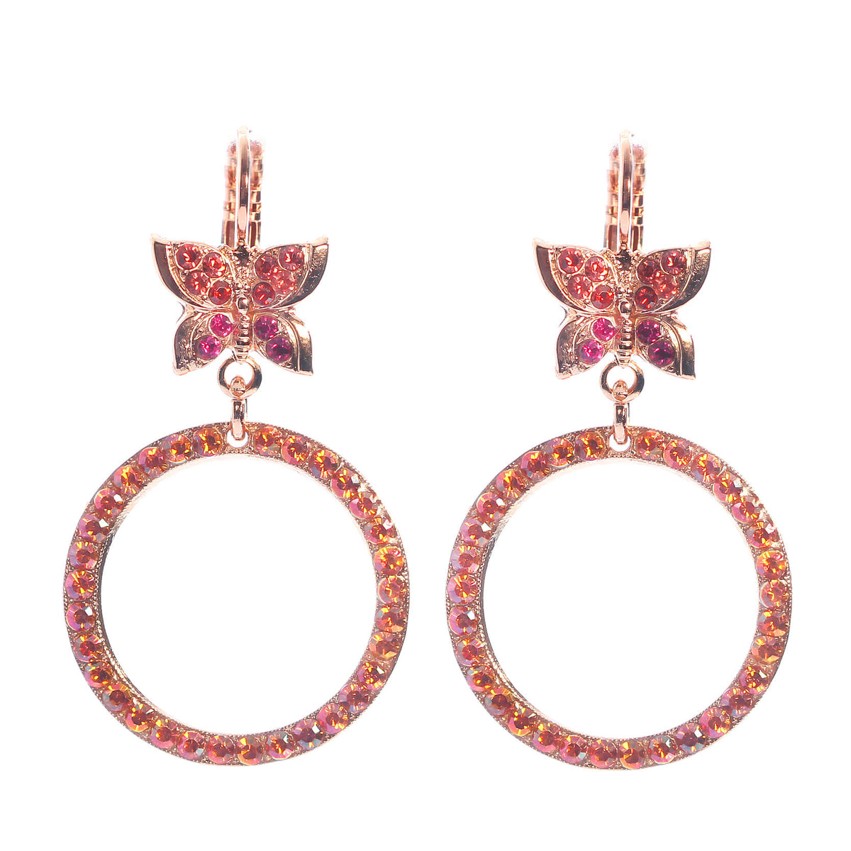 Mariana has featured fuchsia pink, ripe mango and fire engine red Swarovski crystals in this vibrant collection, named Sorbet Delight.A delightful, fun setting with a small butterfly at the top and round hoops on the bottom. Measures 4.5cm, set with French hooks and enveloped in warm rose gold plating.