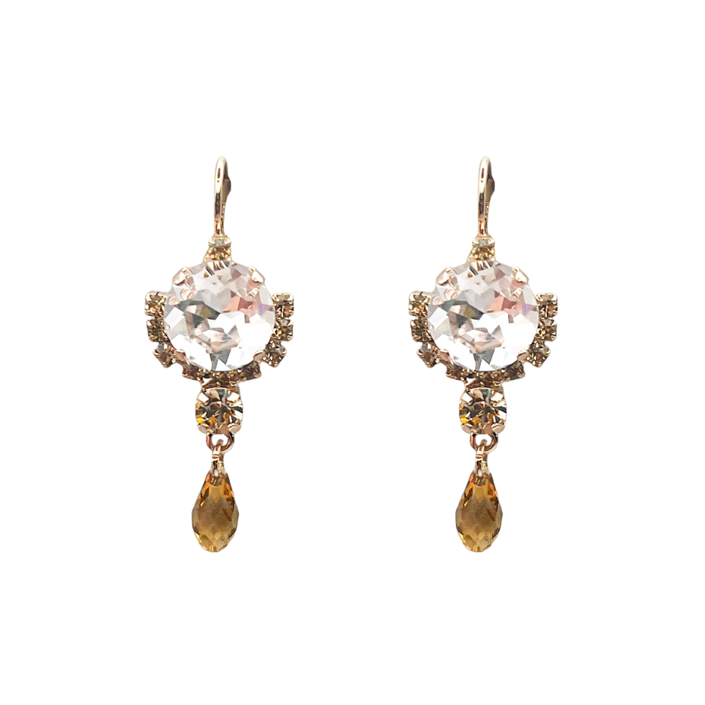 Pair of earrings with crystal and teardrop gemstones on a white background