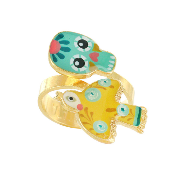 Taratata presents its quirky, French chic flavoured Lucky Charm jewellery collection. This adjustable ring has the shape of a mustard yellow bird in flight decorated with aqua flowers co-ordinated with the Day of the Dead turquoise skull.
