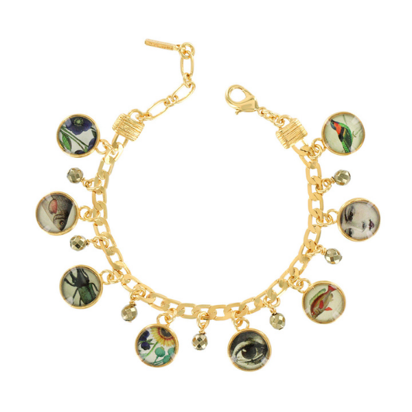 Image of a Taratata medallion bracelet featuring flora, fauna images, a female face and an eye.