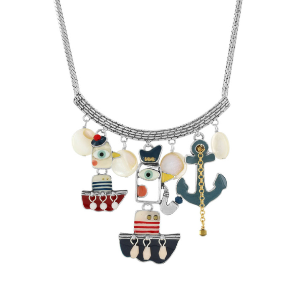 Image of quirky necklace featuring duck sailors in boats and anchor, all hand painted on silver metal chain.