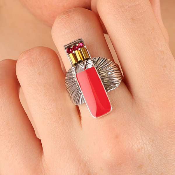Image of model wearing pretty ethnic style ring hand painted in pink with coloured precious stones and beads on silver plated finish.
