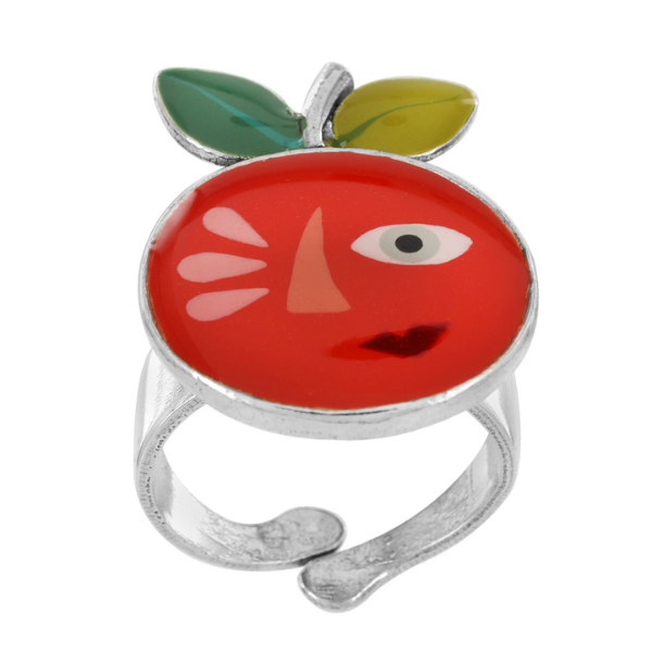 Image of quirky ring with a large happy orange face feature on silver metal finish.