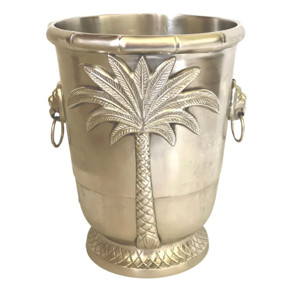 Image of brass wine ice bucket with palm tree feature on silver finish.