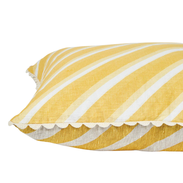 Image of Dina Stripe Vanilla Cushion 60cm x 60cm cushion with a cream scalloped trim.
