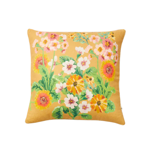 Image of 60 x 60 cm cushion with bright floral patterns on tan linen.