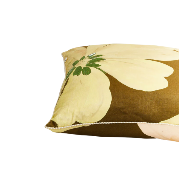 Image of 60 x 60 cm cushion with Moss flowers on linen finished with a natural raffia trim.