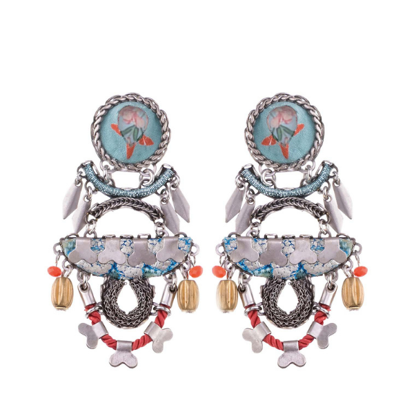 Handmade from patterned aqua textiles, this Sombrero range from Ayala Bar's Hip Collection has a festive feel. Coral coloured cord and patterns highlight the bohemian designs of this remarkable range.