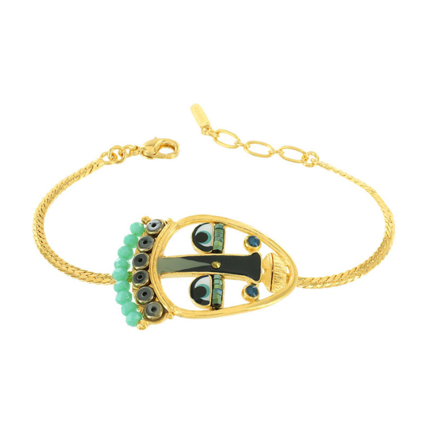 Image of gold metal bracelet with big face using blue coloured beads and stones.