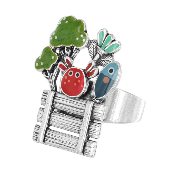 Image of quirky silver metal ring with market produce hand painted features.