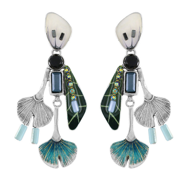 Image of elegant earrings on stud encrusted with hand painted patterns and stones with blue tones.