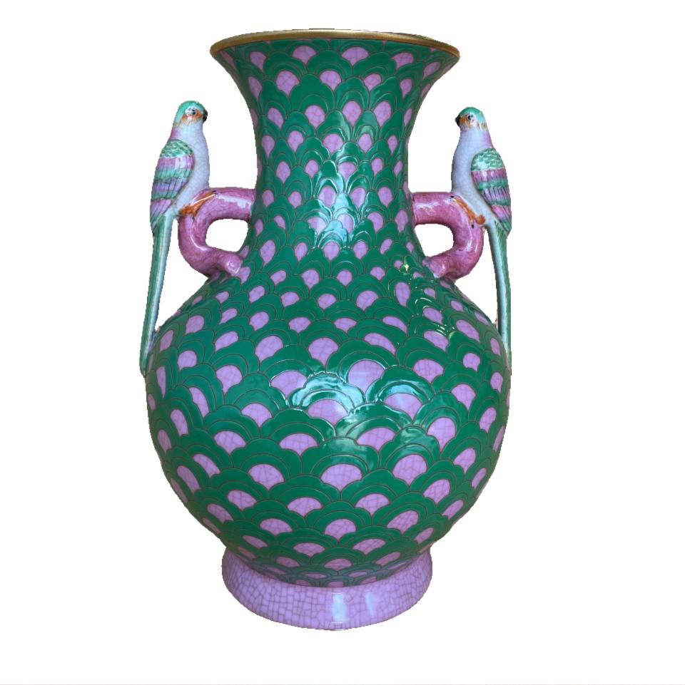 Image of CAM vase is a masterpiece with its ornate bird decorative handles. Deep green and pink in the scallop pattern.
