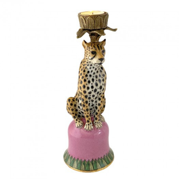 Image of statuesque porcelain Jaguar candle holder formed from porcelain and bronze sitting on a glazed pink crackle finish with green leaves.  How impressive would be a pair sitting on your dining table?