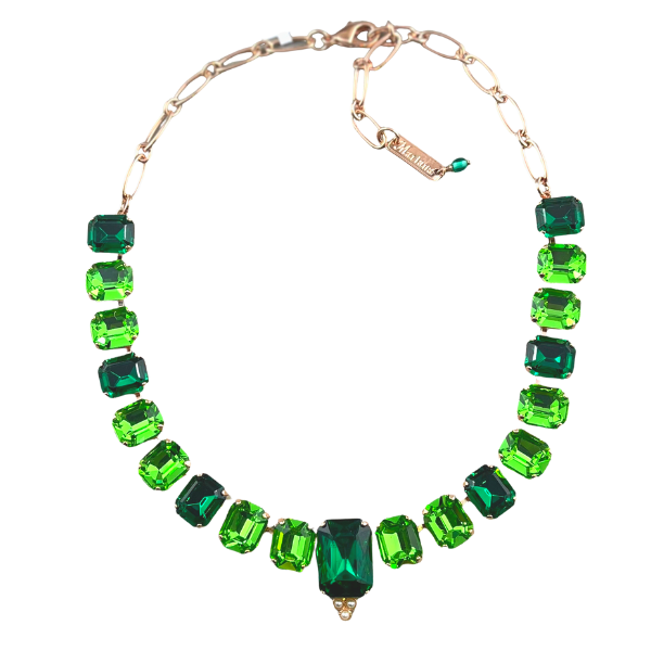Image of outstanding statement necklace embellished with big rectangular emerald green and green swarovski crystals and a larger emerald green centrepiece crystal set in 18ct rose gold plated metal.