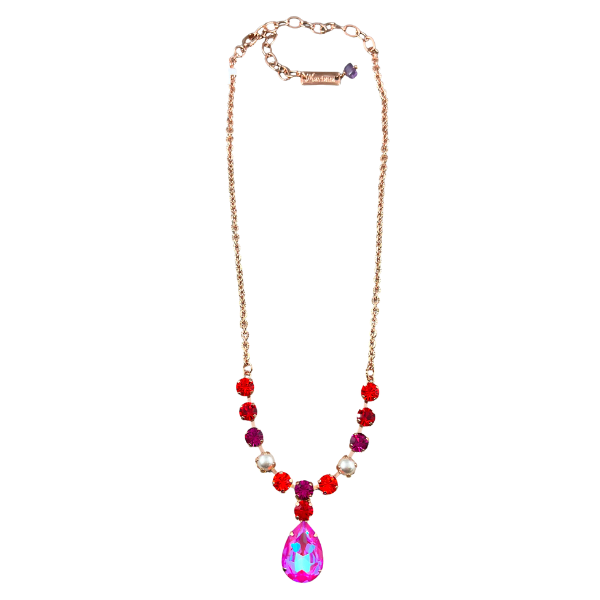 Image of bright pendant necklace embellished with red and purple crystals and faux pearls with fuchsia teardrop pendant on 18 carat rose gold metal.