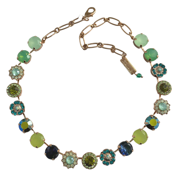 Mariana&#39;s Cruising the Caribbean Necklaces are layered in 18-carat Rose Gold featuring Austrian &amp; Czech Crystals:  Chrysolite (238), Peridot Green (214), Erinite Green (360), Pacific Opal (390), Mint Green (397), Royal Green (252), Green Tourmaline (373) that have been co-ordinated with Semi-precious stones:  Green Opalite (M8).