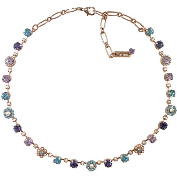 Image of dainty Swarovski crystal necklace with turquoise and lilac crystals with faux pearls. Rose Gold plated chain.